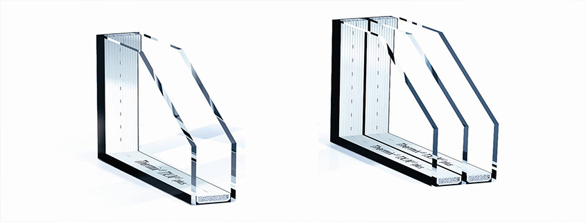 Two hands using a scale ruler on a set of blueprints